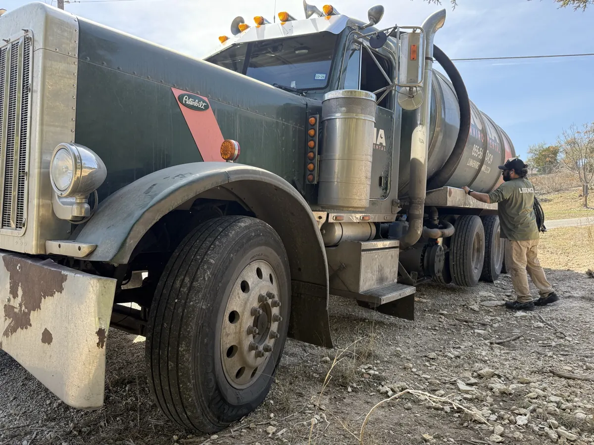 Luna Environmental Peterbilt pump truck on a job site